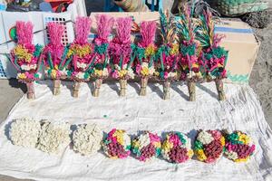 The vivid flowers for praying and offering to Hindu god on Mt.Bromo crater in East Java of Indonesia. photo