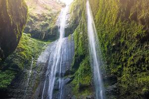 Beautiful view of Madakaripura waterfalls the tallest waterfalls in Java island and second tallest waterfalls in Indonesia. photo