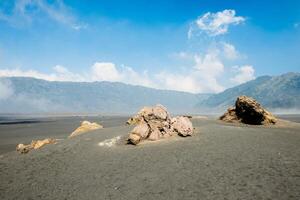 The scenery view of Whispering Sand on the volcanic complex in ancient caldera in Bromo Tengger Semeru national park, East Java, Indonesia. photo
