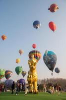 Chiang Rai, Thailand - February-14-2024 - International ballon fiesta 2024 festival in Singha park, Chiang Rai. This event is the year to experience giant balloons up close in Thailand. photo