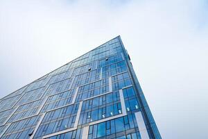 Modern office building glass facade. Architecture details. photo