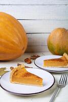 Pumpkin tart for autumn holidays. American pumpkin pie. Halloween background. photo