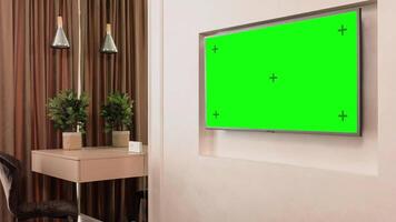 LED inteligente televisión pantalla con un blanco verde antecedentes en el vivo habitación. croma llave pantalla para publicidad. burlarse de arriba verde pantalla chromakey monitor con aislado marcador de posición video