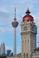 Kuala Lumpur, Malaysia on May 22, 2023. Close up of the clock tower, Big Ben Malaysia. Seen the Kuala Lumpur Tower. Near Masjid Jamek station. photo