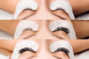 Eyelash Extension Procedure. Woman Eye with Long Eyelashes. Close up, selective focus. photo