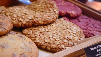 Many different cookies on trays display bakery cafe video