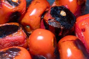 Fire-roasted saladette tomatoes for cooking, Solanum lycopersicum photo