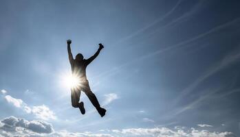 Man jumping with full sky background, sun rays, enjoying a moment of success, with space for text photo