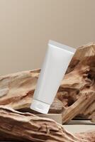 Cosmetic cream tube mockup on woods log and beige scene. abstract background for cosmetic presentation. 3D rendering photo
