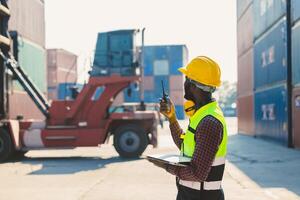 customs shipping staff worker working at cargo port container ship yard with radio control photo