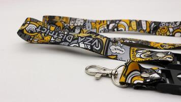 Cool yellow lanyard isolated photo