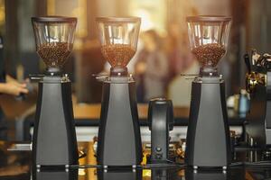 multiple coffee grinder machine for each type of coffee bean in specialty coffee cafe business photo