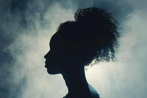 AI generated Silhouette of woman's head with waving hair photo