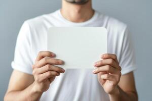 AI generated Man holds a blank white sign in hands. Generative AI photo