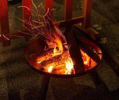 Wood burning in the brazier photo