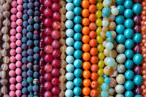 AI generated Close up of a pile of shiny colorful beads. Generative AI photo