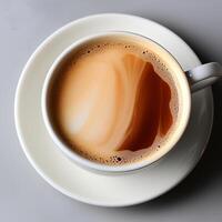 ai generado un taza de capuchino aislado en blanco antecedentes foto