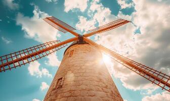 AI generated old windmill in the country. blue cloudy sky photo