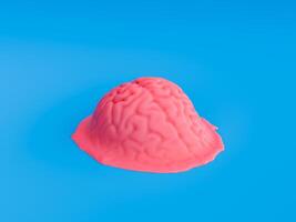 Melting Brain Concept on Blue Background photo