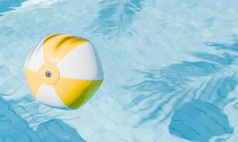 Beach Ball Floating on Pool Water photo