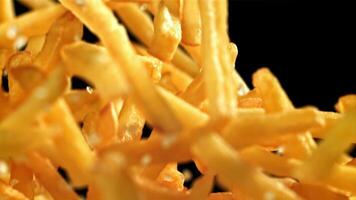 French fries fly up and fall down. Filmed on a high-speed camera at 1000 fps. High quality FullHD footage video