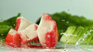 Crab meat falls on the table. Filmed on a high-speed camera at 1000 fps. High quality FullHD footage video