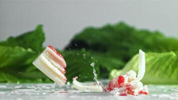 Crab meat falls on the table. Filmed on a high-speed camera at 1000 fps. High quality FullHD footage video