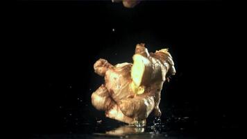 Fresh ginger falls on the table. Filmed on a high-speed camera at 1000 fps. High quality FullHD footage video