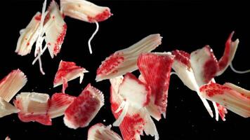 Fresh crab sticks fly up and fall down. Filmed on a high-speed camera at 1000 fps. High quality FullHD footage video