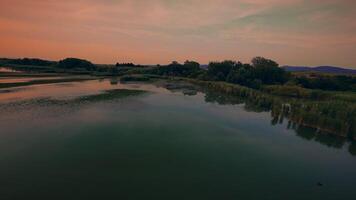 Stunning sunrise over the lake video