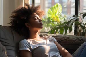 AI generated Black woman resting on sofa at living room photo