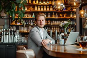 AI generated Entrepreneur Working on Laptop in Cozy Bar Setting. photo