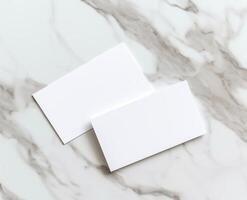 AI generated Two blank business cards on marble surface, personal branding picture photo