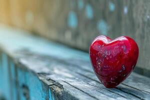 ai generado un rojo corazón se sienta en parte superior de un de madera banco. foto