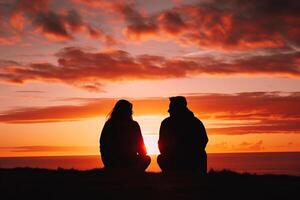 AI generated Silhouette man and woman sitting against a dramatic sunset photo