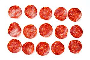 AI generated Collection of several slices of pepperoni isolated on white background photo