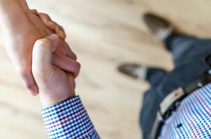 Handshake close view background. Business agreement, deal concept photo