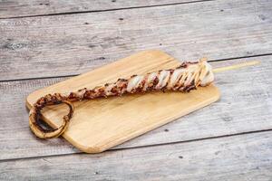 Delicous tasty Grilled octopus tentacle photo