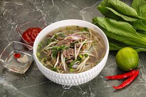 Vietnamese soup Pho Bo with beef photo