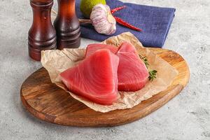 Delicous raw tuna steak for cooking photo