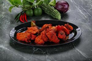 indio cocina - pollo tikka parilla foto