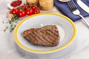 Grilled marble beef steak with sauce photo