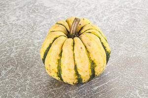 Ripe raw fresh decorative pumpkin photo