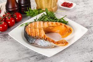 Tasty delicous grilled salmon steak photo