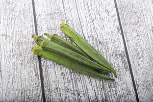 Green ripe tasty okra tropical vegetable photo