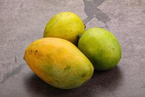 Fresh sweet and juicy mango heap photo