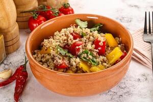 Dietary vegetarian quinoa with vegetables photo