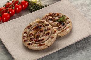 Grilled natural spiral meat sausage photo