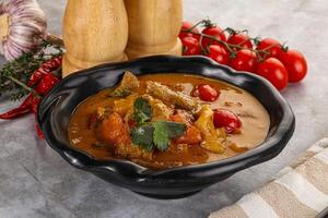 Yellow Thai curry with beef photo