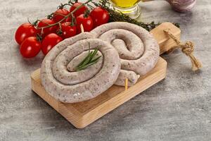 Natural spiral sausage for grill photo